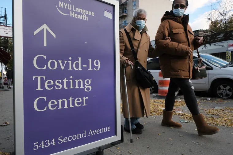 A sign outside of a hospital advertises COVID-19 testing on Nov. 19 in New York City.