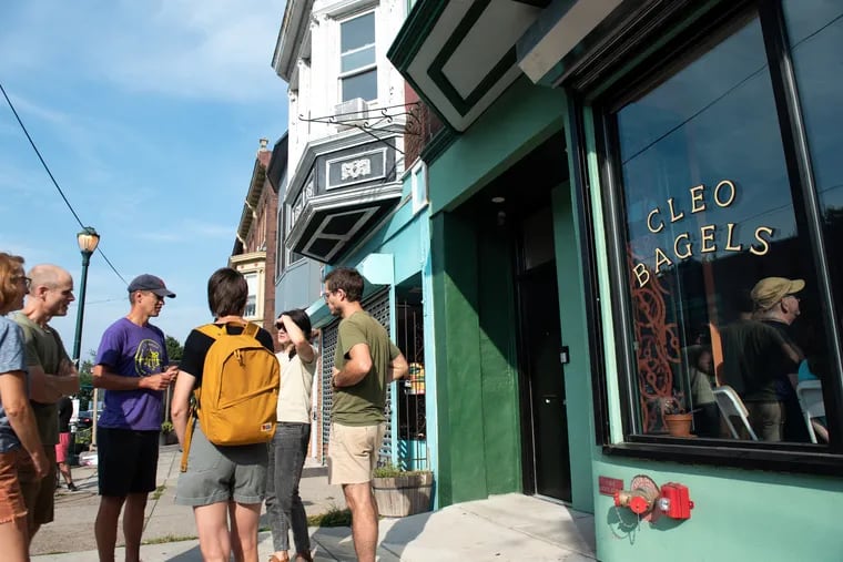 Customers wait to place their orders at Cleo Bagels moments after the 9 a.m. grand opening on Saturday, Sept. 9, 2023 on Baltimore Avenue in Philadelphia.