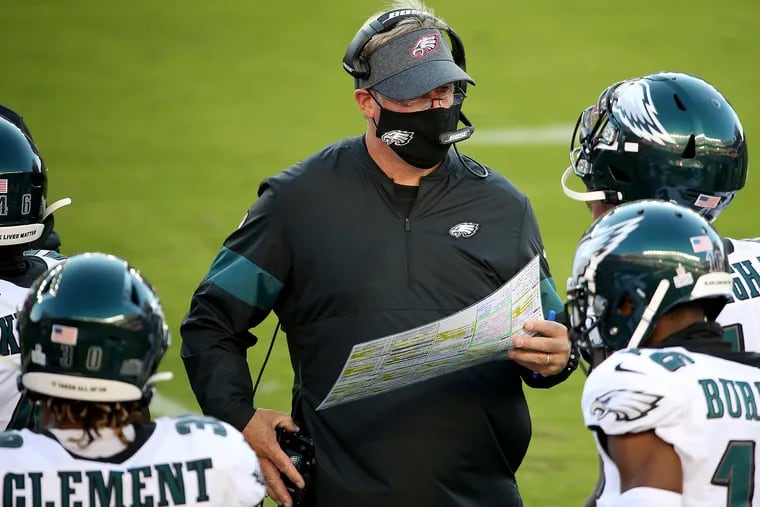 Eagles head coach Doug Pederson works the sideline in the first quarter against the 49ers.