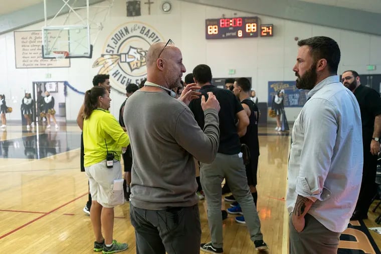 Gavin O'Connor directs Ben Affleck on the set of 'The Way Back.'