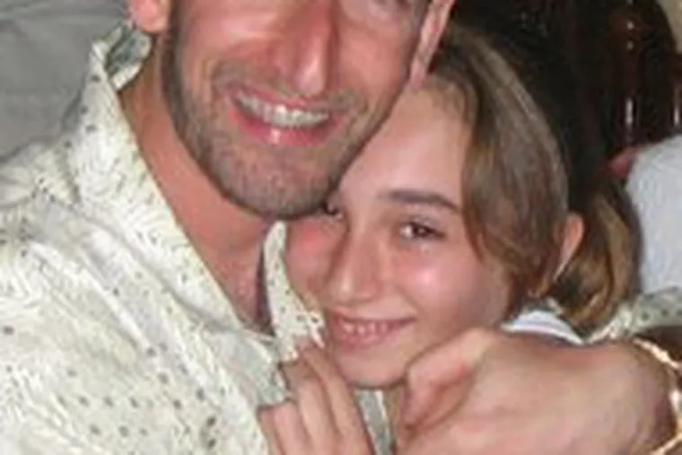 Michael Klein (left) hugs daughter Talia in undated family photo. Their bodies were found yesterday after plane crash in a mountainous region of Panama.
