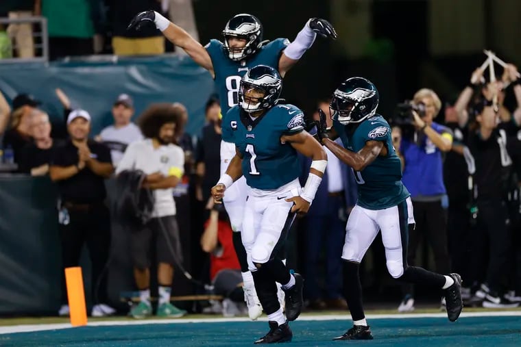 Eagles quarterback Jalen Hurts (1) celebrates his second-quarter touchdown run against the Minnesota Vikings at Lincoln Financial Field on Monday.