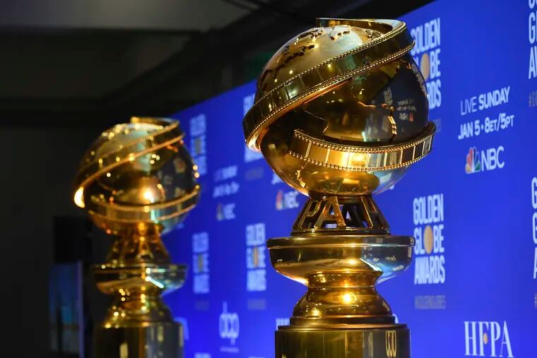 FILE - This Dec. 9, 2019 file photo shows replicas of Golden Globe statues at the nominations for the 77th annual Golden Globe Awards  in Beverly Hills, Calif. The 77th annual Golden Globe Awards will be held on Sunday, Jan. 5.