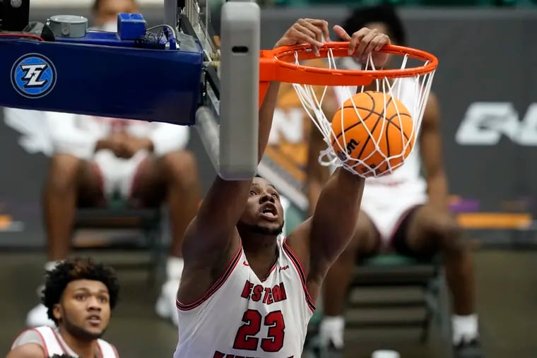 Western Kentucky center Charles Bassey dunks during the second half of the team's NCAA college basketball game against Louisiana Tech in the quarterfinals of the NIT, Thursday, March 25, 2021, in Frisco, Texas.