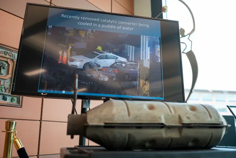 Video of a recently stolen catalytic converter is shown at a news conference Tuesday in Doylestown. Bucks County District Attorney Matt Weintraub held the conference to announce the dismantling of a catalytic converter theft ring that targeted victims in Bucks County, Montgomery County, and the Philadelphia region.