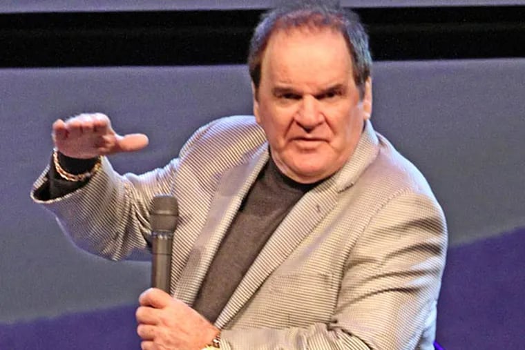 Ex-Phillie Pete Rose sits on stage and tells baseball stories at Christ's Church of the Valley early Sunday morning. (Michael Bryant/Staff Photographer)