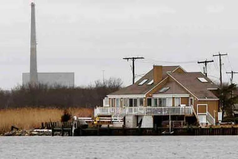 Homes on Barnegat Bay, which is to be revitalized by a plan announced Thursday, are not far from the Oyster Creek reactor. (Mel Evans / AP)