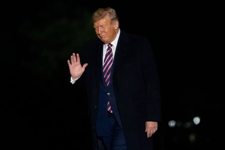 President Donald Trump arrives at the White House in Washington, late Tuesday, Sept. 22, 2020, following a short trip from Andrews Air Force Base, Md., after attending a rally in Pittsburgh. (AP Photo/Andrew Harnik)