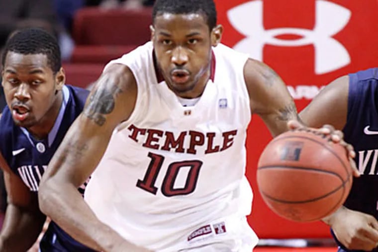 Temple guard Ramone Moore and teammate Juan Fernandez form one of the best backcourts in the country.  (H. Rumph Jr/AP)