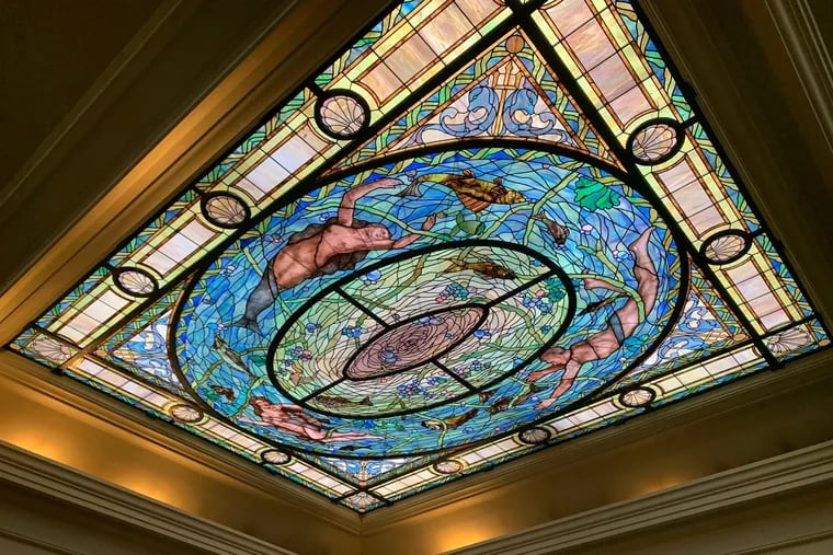 A stained-glass skylight depicts Neptune's daughter and other underwater whimsies in the men's dressing room at the Fordyce Bathhouse, an ornate Renaissance Revival structure built in 1915 that's now home to the national park's visitor center and museum.