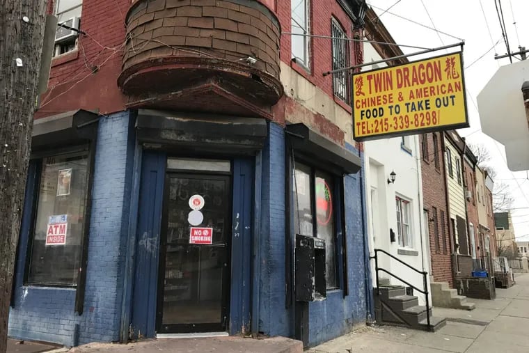 The Twin Dragon Chinese takeout, at 27th and Dickinson Streets in South Philadelphia, where a 17-year-old boy was shot in the head and critically injured about 9:15 p.m. Tuesday, Dec. 19, 2017. The shooter fired a bullet from outside that went through the takeout’s front glass door and hit the victim who was inside.