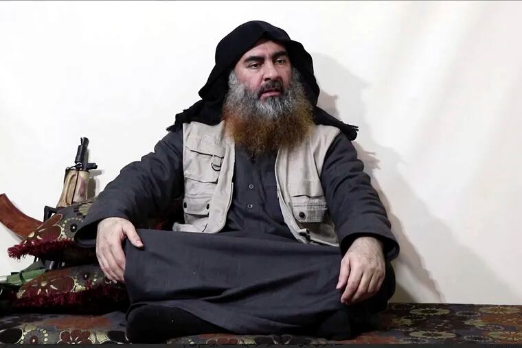 This image made from video posted on a militant website on Monday, April 29, 2019, purports to show the leader of the Islamic State group, Abu Bakr al-Baghdadi, being interviewed by his group's Al-Furqan media outlet. Al-Baghdadi acknowledged in his first video since June 2014 that ISIS lost the war in the eastern Syrian village of Baghouz that was captured last month by the Kurdish-led Syrian Democratic Forces. (Al-Furqan media via AP)