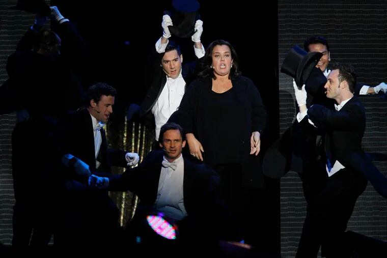 Rosie O'Donnell performs during a star-studded double-taping of "Surprise Oprah! A Farewell Spectacular," Tuesday, May 17, 2011, in Chicago. "The Oprah Winfrey Show" is ending its run May 25, after 25 years, and millions of her fans around the globe are waiting to see how she will close out a show that spawned a media empire. (AP Photo/Charles Rex Arbogast)