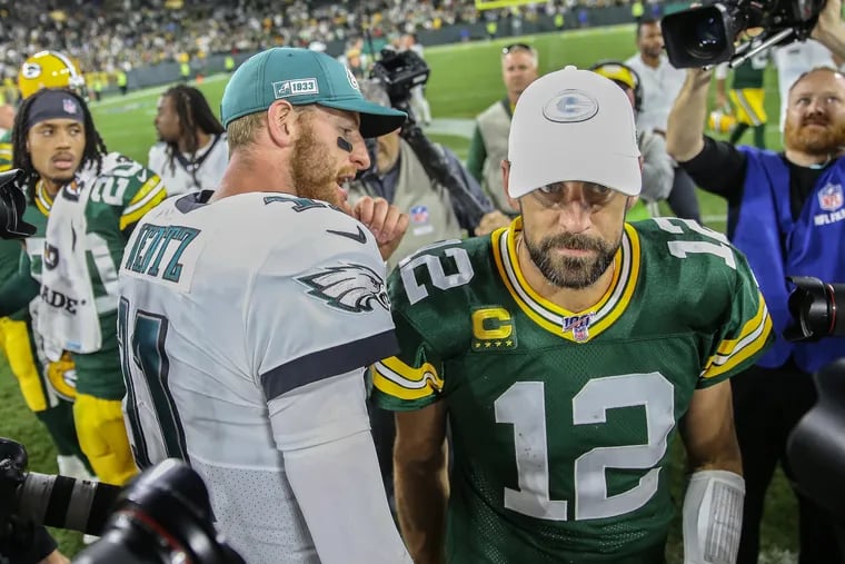 Carson Wentz and the Eagles will meet Aaron Rodgers (right) for the second consecutive season. As great as Rodgers is, he is not among our top-3 quarterbacks on the Eagles schedule, which will be released Thursday night.