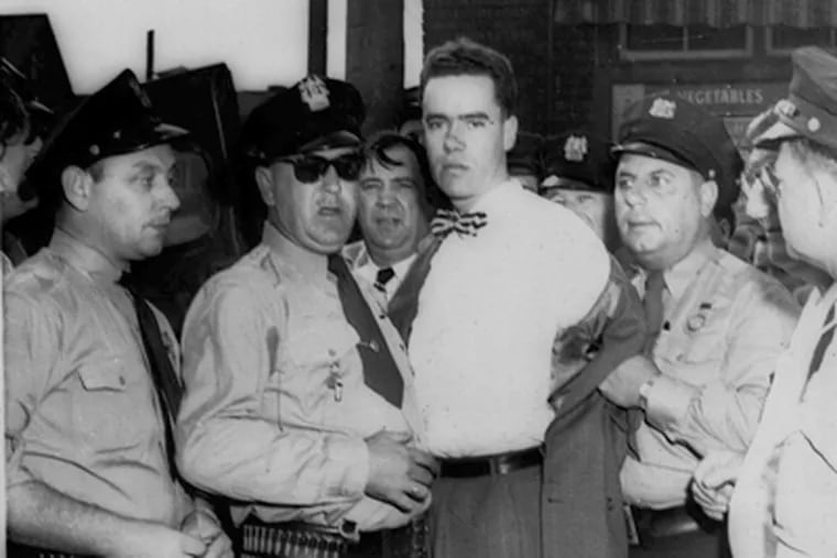 Howard Unruh in custody after he killed 13 in a 1949 Camden rampage. Hundreds of case files were released last week. (Associated Press)