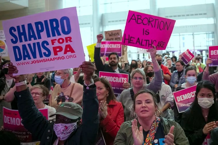 The crowd cheers during a rally held by Pennsylvania Democrats at the Pennsylvania Convention Center in Philadelphia on Friday, May 6, 2022. Josh Shapiro, Tom Wolf, Madeleine Dean and others spoke at the event. (Heather Khalifa/The Philadelphia Inquirer/TNS)