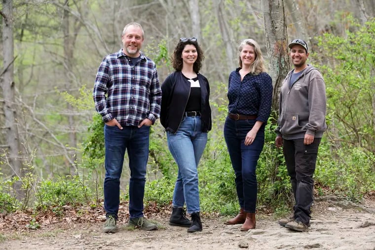 (From left) Friends of the Wissahickon staffers Shawn Green, director of field stewardship; Pauline Berkowitz, project manager; Ruffian Tittmann, executive director; and Varian Bosch, field manager, at Wissahickon Valley Park.