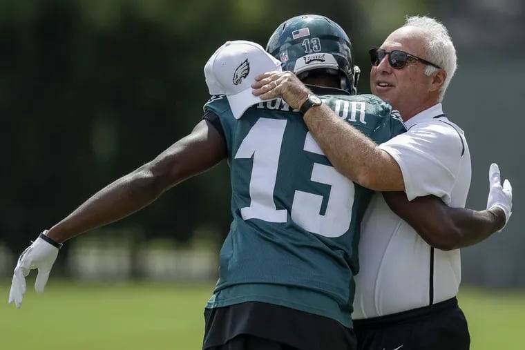 Eagles Chairman and Chief Executive Officer Jeffrey Lurie with wide receiver Nelson Agholor during team practice at the NovaCare Complex on Thursday.