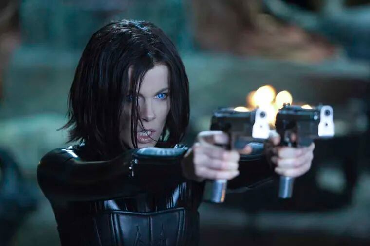 In this film image released by Sony Pictures Entertainment, Kate Beckinsale is shown in a scene from "Underworld: Awakening."  Beckinsale reprises her role as vampire warrior Selene in the fourth installment of the popular �Underworld� franchise. (AP Photo/Sony Pictures Entertainment)