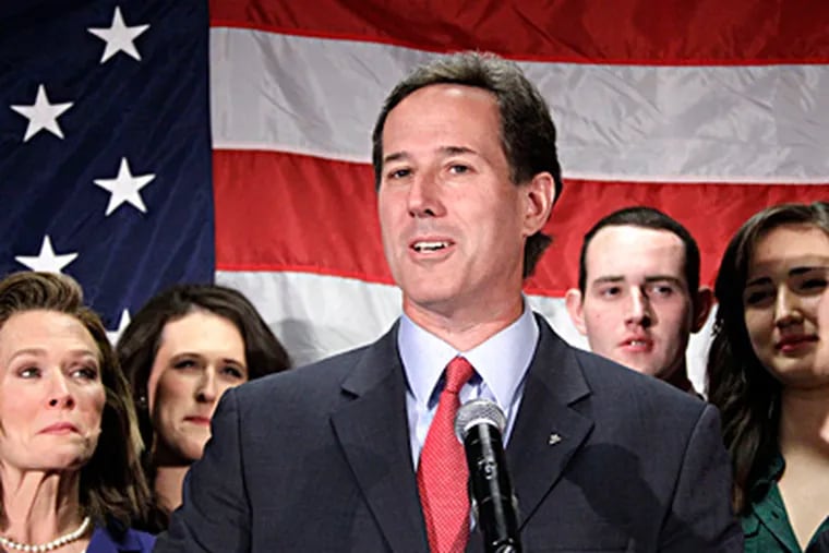 Joined by family members, former U.S. Sen. Rick Santorum announces in Gettysburg that he will suspend his campaign for the GOP presidential nomination. Still, he said, "we are not done fighting." GENE J. PUSKAR / Associated Press