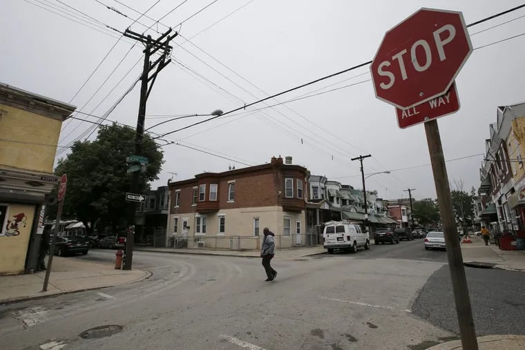 The intersection of North 23rd and Huntingdon Streets in North Philadelphia. Ten people were shot in one incident, on May 20. YONG KIM / Staff Photographer.