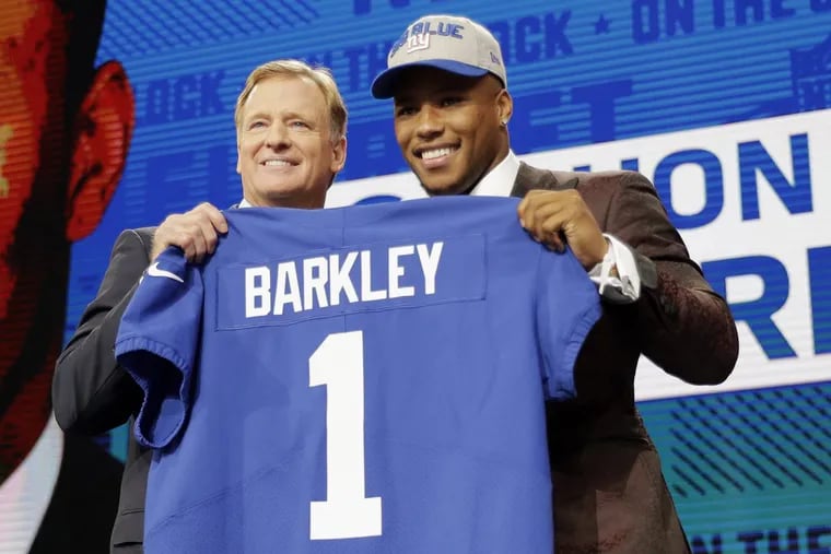 Saquon Barkley, right, with commissioner Roger Goodell after being selected by the Giants.