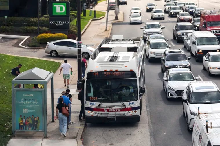 Passengers board a SEPTA bus on City Avenue in Wynnefield Heights.