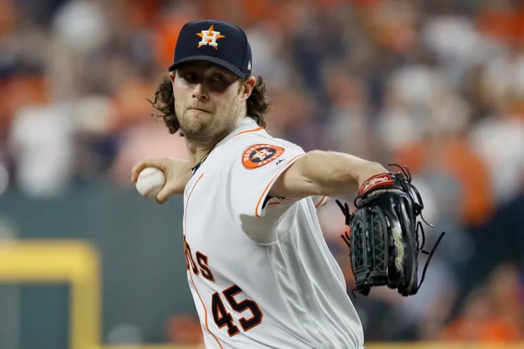 Houston Astros starting pitcher Gerrit Cole throws against the Washington Nationals during the first inning of Game 1 of the baseball World Series Tuesday, Oct. 22, 2019, in Houston. (AP Photo/Matt Slocum)