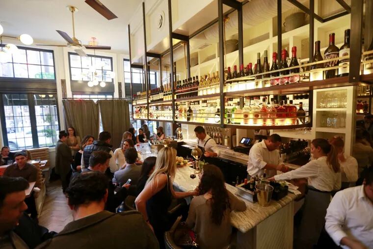 At Tredici Enoteca, at 13th and Sansom Streets, diners looking for a table may face a wait at the gleaming marble bar, no matter whether the restaurant is crowded.