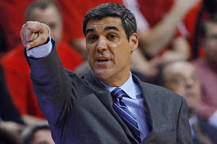 Jay Wright's Wildcats escaped with a 77-71 win at Rutgers on Thursday night. (Rich Schultz/AP)