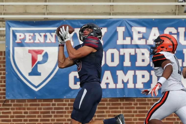 Penn wide receiver Justin Watson makes one of his two touchdown catches in the Quakers’ 38-35 win over Princeton at Franklin Field.