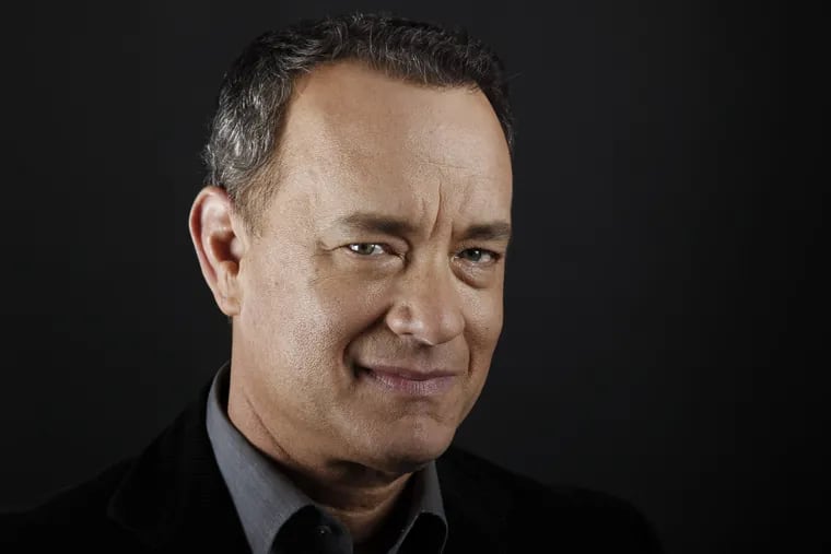 In this June 18, 2011 file photo, actor Tom Hanks poses for a portrait in Beverly Hills, Calif.
