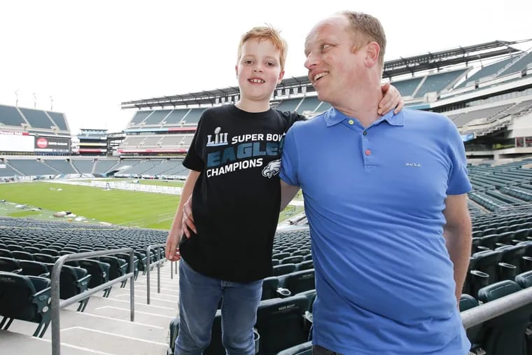 Bram Hendriks with his son Thijmen, 8, inside Lincoln Financial Field on Friday, May 18, 2018.