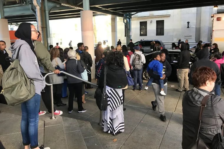 Passengers on the Market-Frankford Line train that hit and killed a man Tuesday morning waiting to be picked up by shuttle buses,