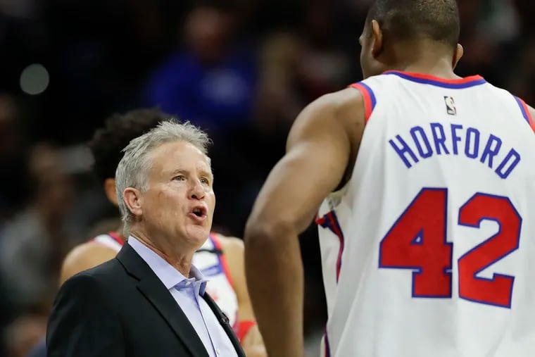 Sixers Head Coach Brett Brown, taking  to  Sixers center Al Horford, has annually been on the coaching hot-seat here in Philadelphia.