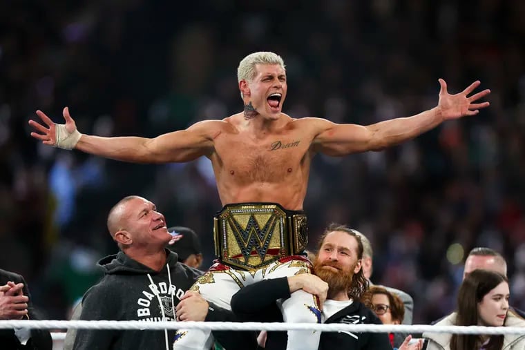 Cody Rhodes celebrates after winning the Undisputed WWE universal championship match during WrestleMania 40 at Lincoln Financial Field on Sunday.