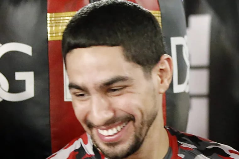 Danny Garcia won with a 9th-round knockout.