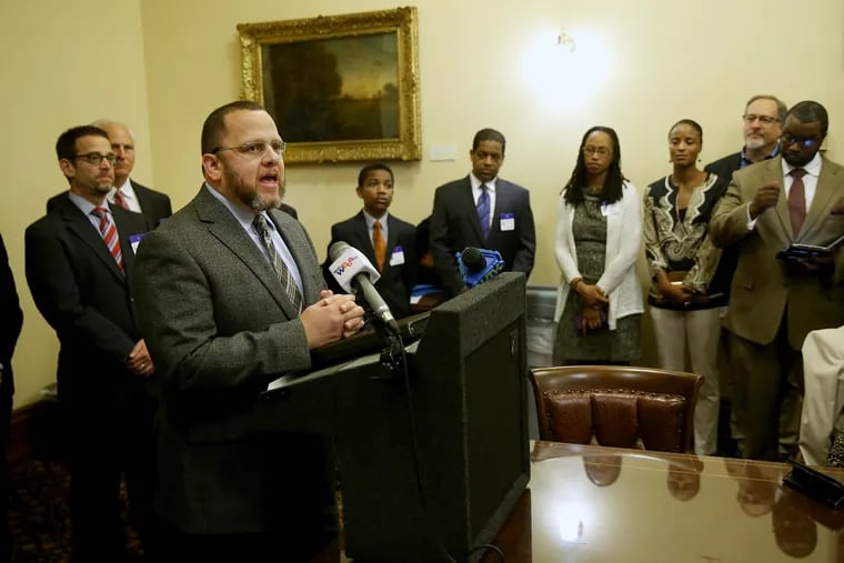 Latino Action Network President Christian Estevez speaks during a news conference announcing a school desegregation lawsuit against the state of New Jersey at the state house in Trenton, N.J., on Thursday, May 17, 2018. A group of civil rights and religious leaders, led by former New Jersey Supreme Court Justice Gary Stein, alleges that the state's public schools remain segregated due to a law requiring children to attend their neighborhood schools coupled with existing housing segregation.