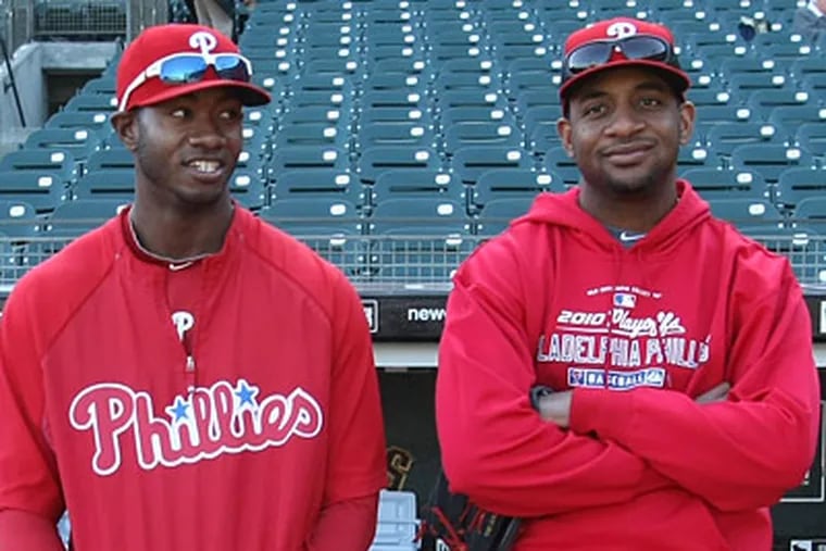 Domonic Brown, left, and Ben Francisco are among the candidates to replace Jayson Werth in right field. (Ron Cortes / Staff Photographer)
