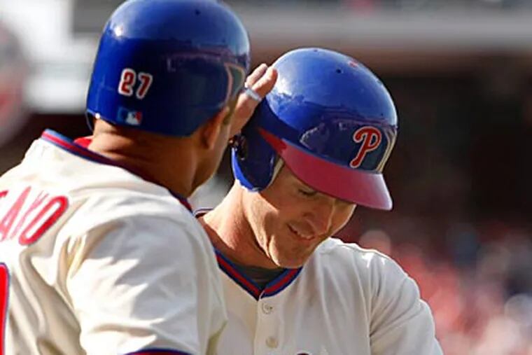 Placido Polanco and Chase Utley will be out for an extended period of time.. (Ron Cortes / Staff Photographer)
