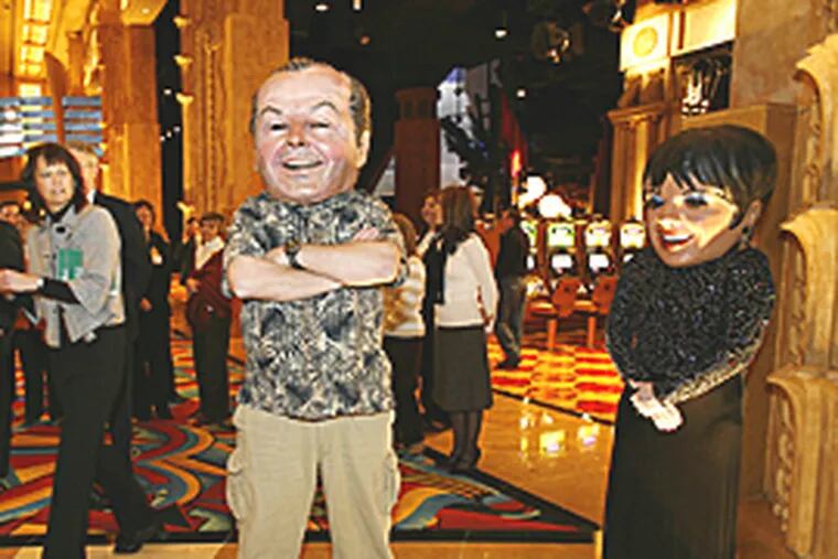 Employees in costume as Jack Nicholson and Liza Minnelli at the opening of the Hollywood Casino at Penn National Race Course in Grantville, Pa. (Eric Mencher/Inquirer)