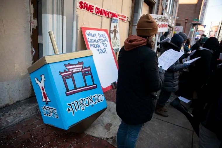 A giant dreidel was on display as Jewish people and other allies gathered in solidarity during a No Arena in Chinatown protest at 10th and Arch Streets in Philadelphia on Sunday. Dozens of people distributed fliers and sang songs.