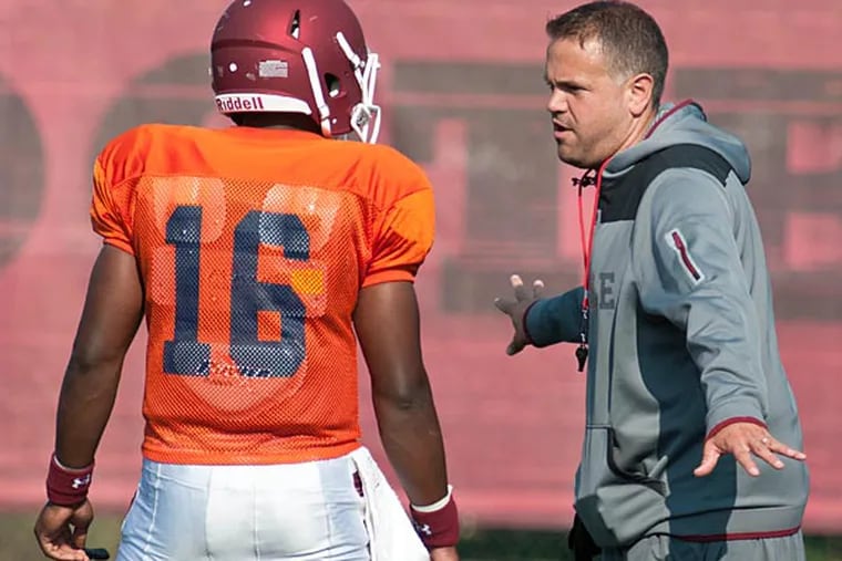 Temple head coach Matt Rhule talks to a player during practice. (Ron Tarver/Staff Photographer)
