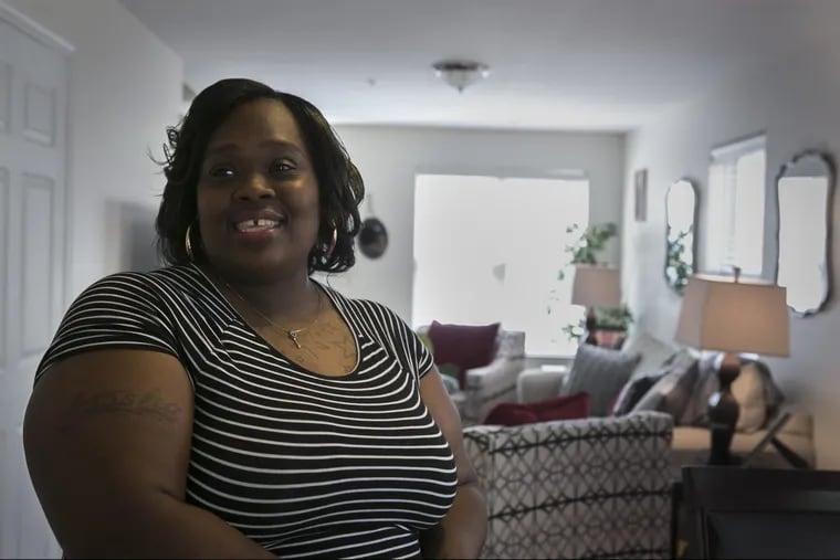 Latasha Raynor furnished the new home she got through Habitat for Humanity Philadelphia with help from design students at Harcum College in Bryn Mawr.