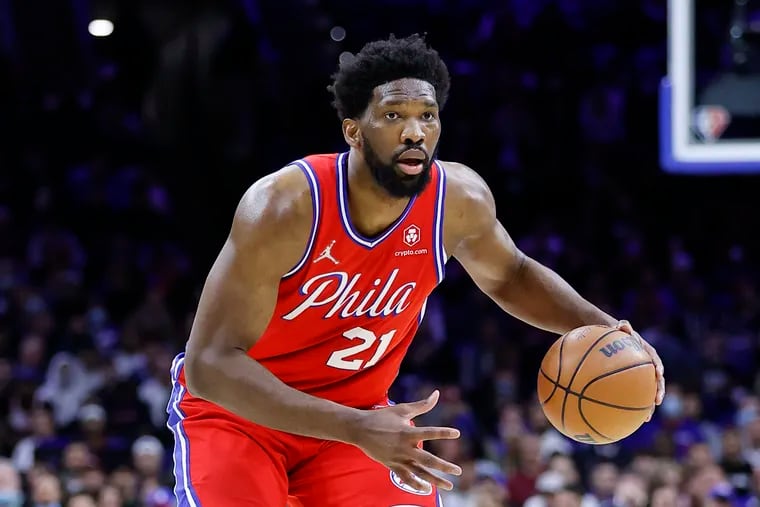Sixers center Joel Embiid holds the basketball against the Toronto Raptors during game two of the Eastern Conference quarterfinals playoffs on Monday, April 18, 2022 in Philadelphia.