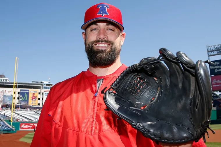 Phillies relief pitcher Pat Neshek with his black glove before the Phillies played the Washington Nationals on Wednesday.
