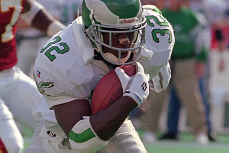 Former Eagles running back Ricky Watters still feels the aftereffects of a bruising football career. (AP file photo)