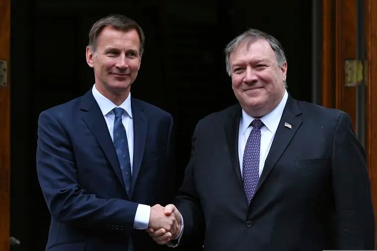 US Secretary of State Mike Pompeo, right, is greeted by Britain's Foreign Secretary Jeremy Hunt in central London, Wednesday May 8, 2019. U.S. Secretary of State Mike Pompeo is in London for talks with British officials on the status of the special relationship between the nations amid heightened tensions with Iran and uncertainty over Britain's exit from the European Union. (Mandel Ngan/Pool via AP)