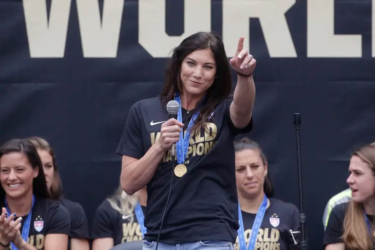 After falling short of induction in her first two years on the ballot, Hope Solo (center) is finally going into the National Soccer Hall of Fame.