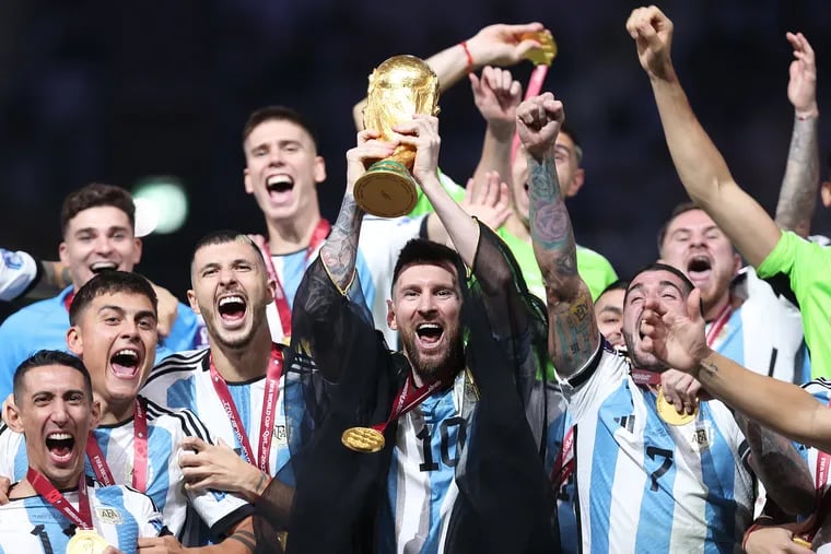 Lionel Messi of Argentina lifts the FIFA World Cup Qatar 2022 Winner's Trophy during the FIFA World Cup Qatar 2022 Final match between Argentina and France at Lusail Stadium on December 18, 2022, in Lusail City, Qatar.